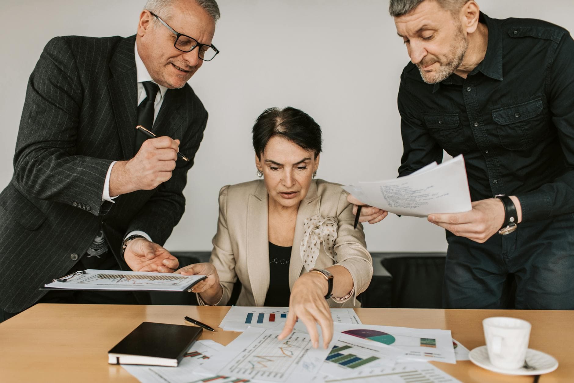 ISO 9001 quality management team review and boardroom discussion